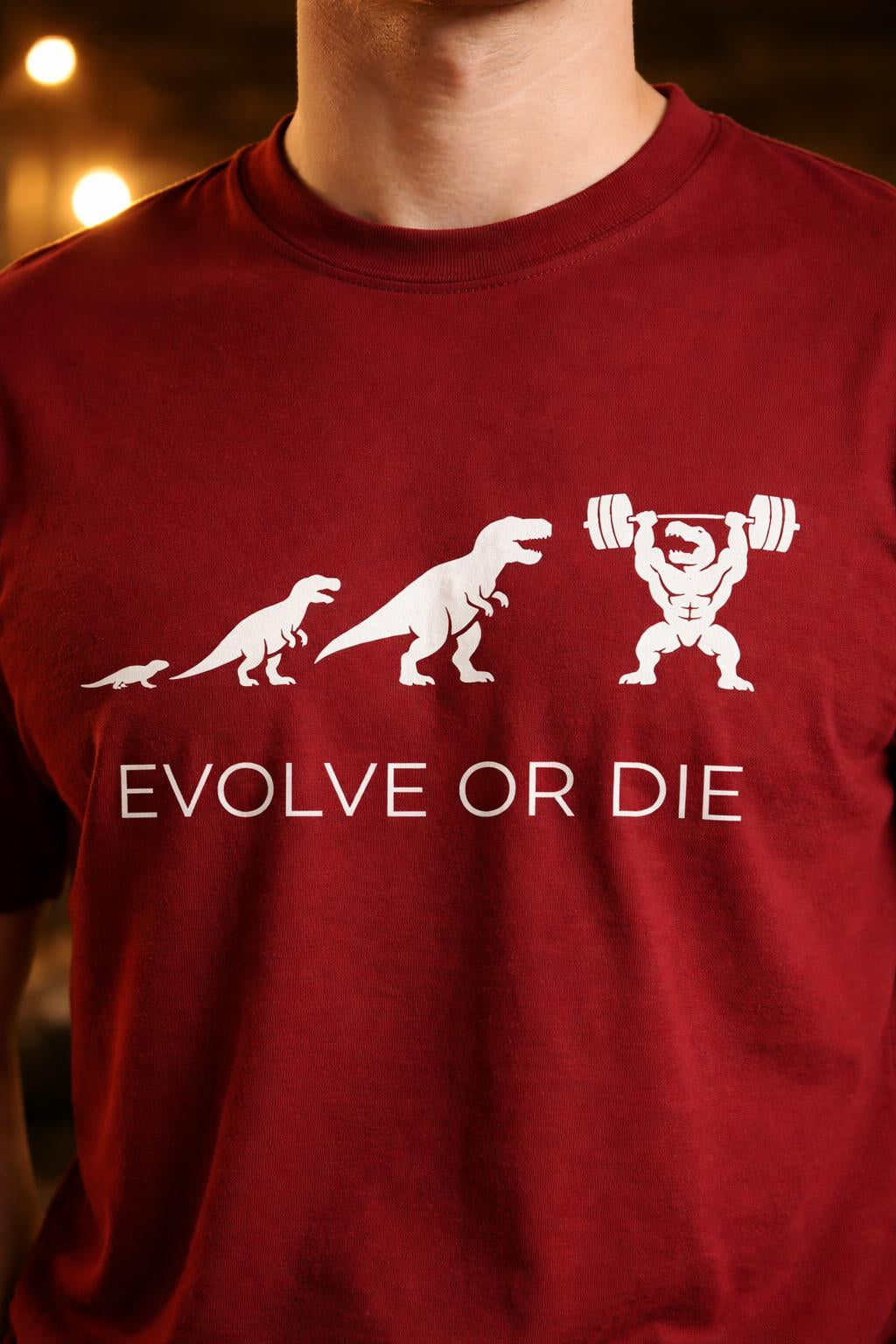 Detail shot of Evolve or Die Organic Fitness Tee - Motivation Dinosaur Gym Shirt