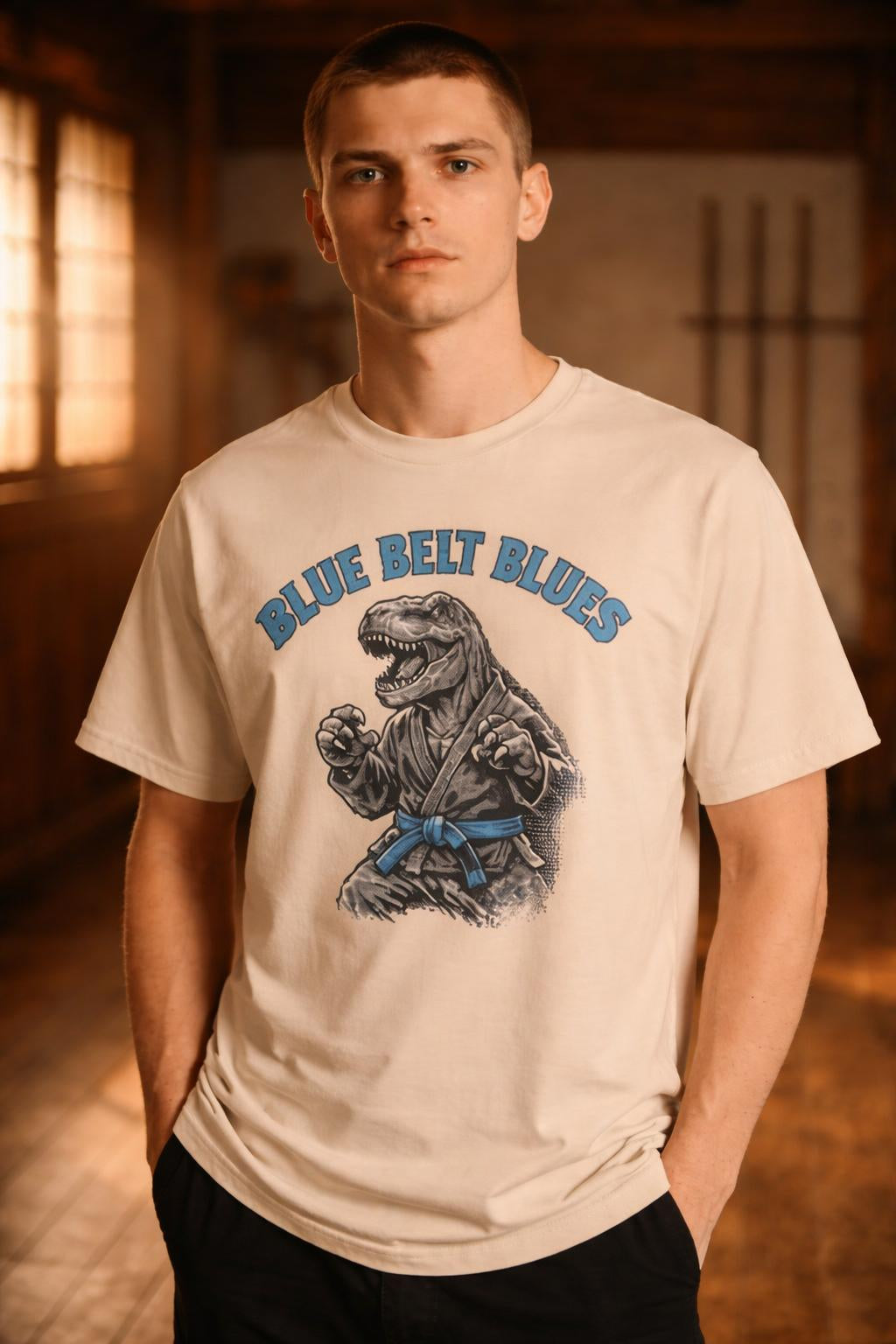 Close-up of the model wearing T-Rex Blue Belt Shirt - Blue Belt Blues Organic Tee