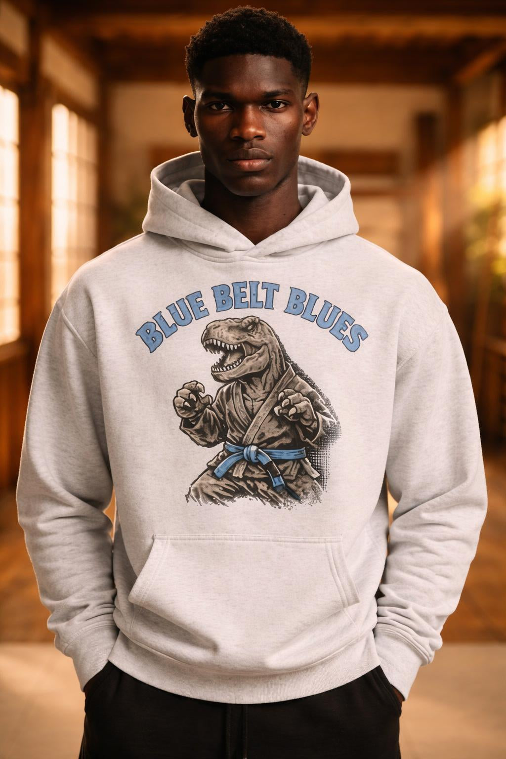 Close-up of the model wearing T-Rex Blue Belt Hoodie - Blue Belt Blues Oversized Pullover