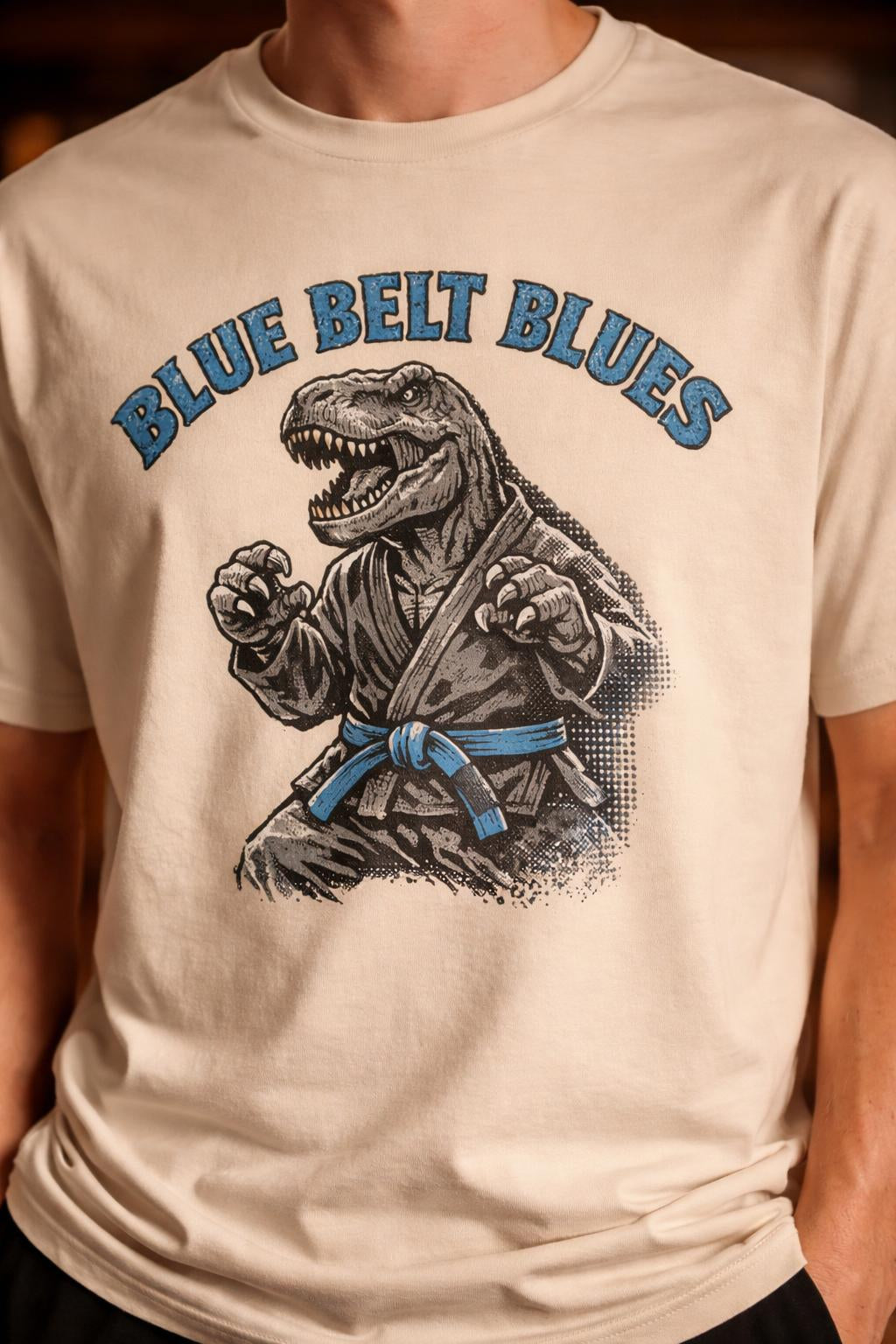 Detail shot of T-Rex Blue Belt Shirt - Blue Belt Blues Organic Tee